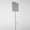 free-standing-stand-in-silver-color-with-1-x-11X17-frame-in-portrait-and-landscape-and-1-x-8.5x11-clear-shelf-in-acrylic-single-sided