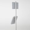 free-standing-stand-in-silver-color-with-1-x-8.5x11-frame-in-portrait-and-landscape-and-1-x-8.5x11-steel-shelf-single-sided-8