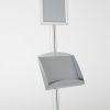 free-standing-stand-in-silver-color-with-1-x-8.5x11-frame-in-portrait-and-landscape-and-2-x-5.5x8.5-steel-shelf-single-sided