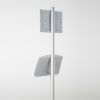 free-standing-stand-in-silver-color-with-1-x-8.5x11-frame-in-portrait-and-landscape-and-2-x-5.5x8.5-steel-shelf-single-sided